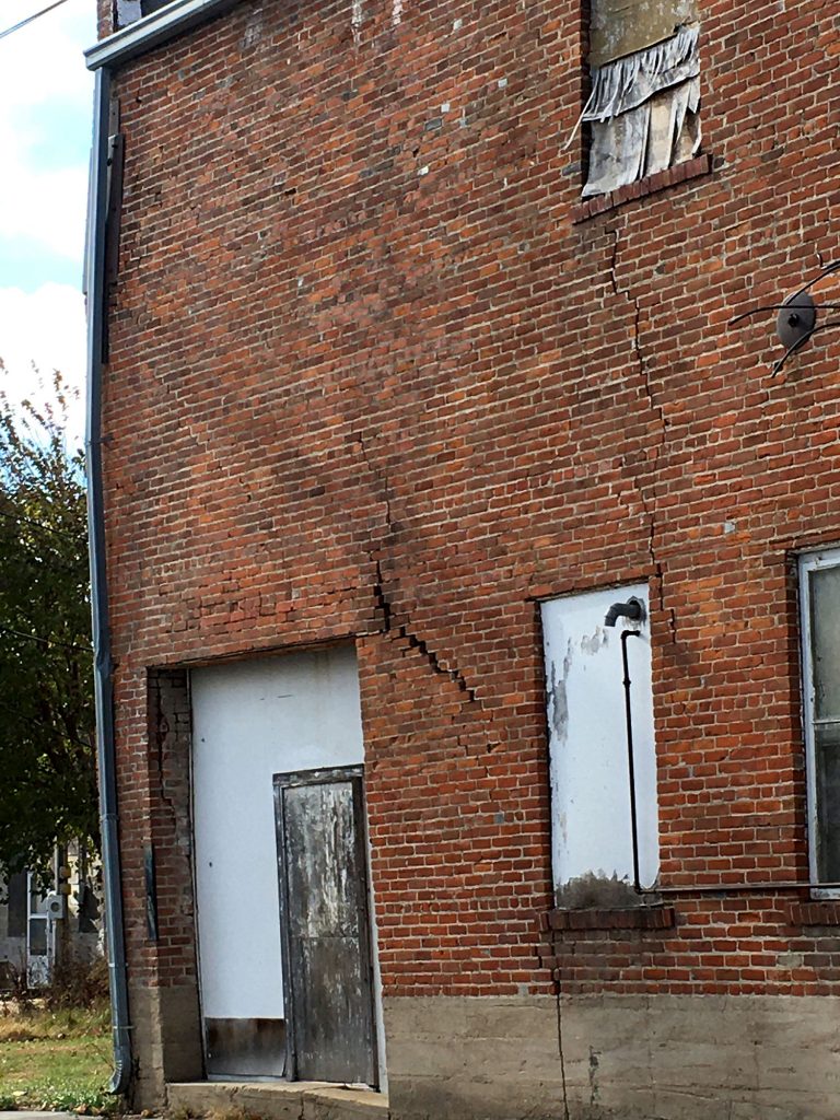 One of the large cracks in the back of the building